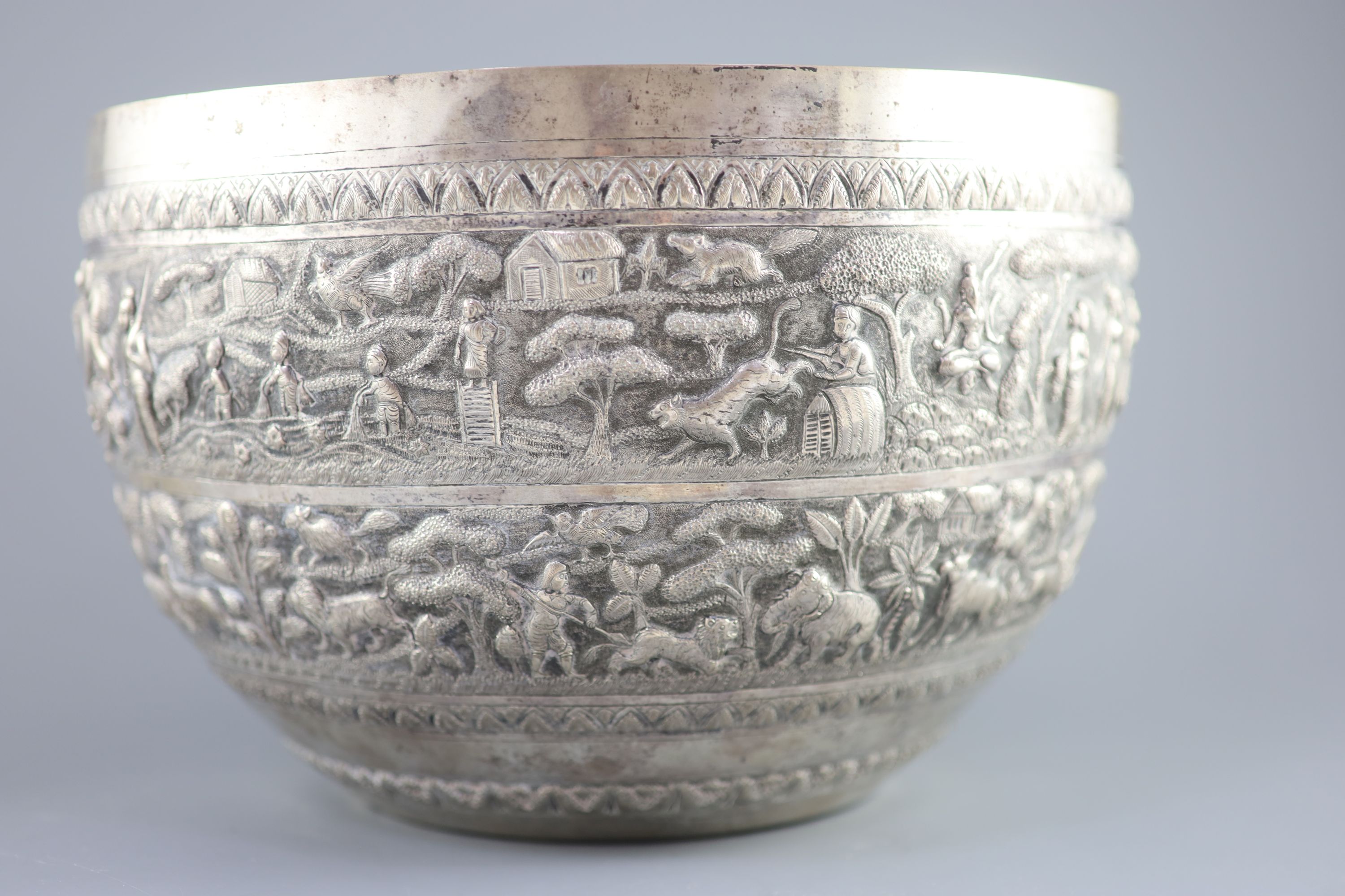 A large late 19th century Indian export embossed silver bowl, diameter 31.2cm, height 20.1cm, 36oz.